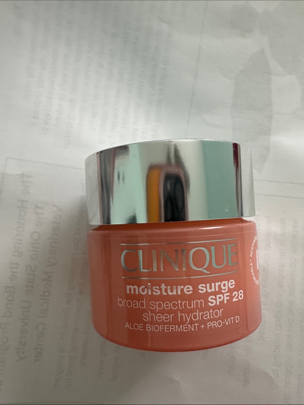 Clinique Moisture Surge Sheer Hydrator - Coral Pink Jar with Silver Lid